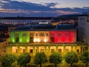 Il Politeama illuminato col tricolore in uno scatto di Tino Gerbaldo