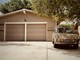 Come possono i garage in legno migliorare la sicurezza e l'eleganza della tua proprietà?