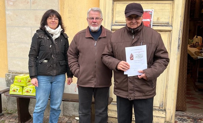 Manuela Millone, don Tonino Marchisio e Matteo Busso vincitore del primo premio della categoria hobbisti