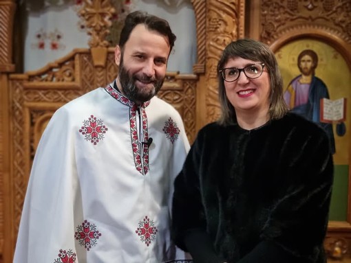 In foto padre Vasile Doroftei con Silvia Gullino